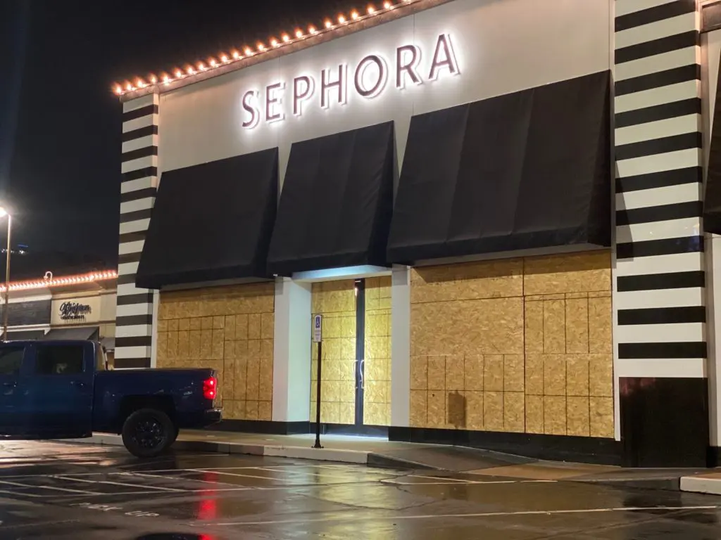 Sephora in Highland Village is wrapped in protective plywood. (Photo by Shelby Hodge)