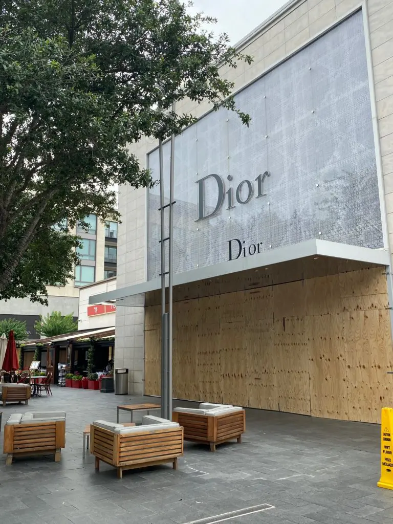 Dior in River Oaks District was ahead of the game, completely boarded up early Sunday. (Photo by Shelby Hodge)