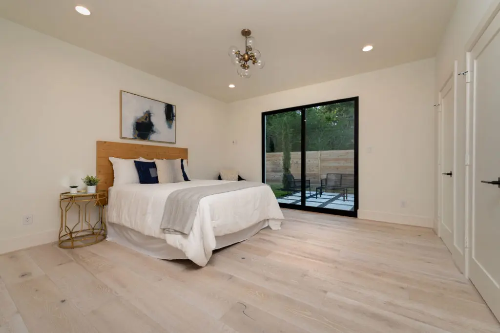 spacious second primary suite with its own private patio.