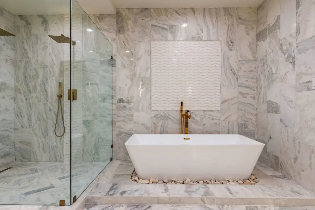 An over-sized soaking tub in the spa bath.
