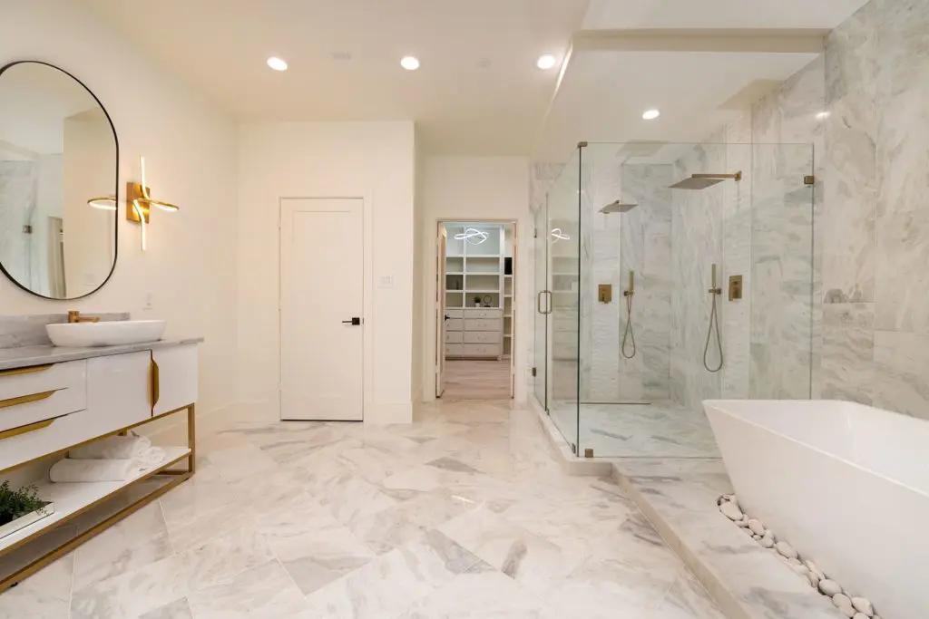 Primary ensuite spa bath and dressing.