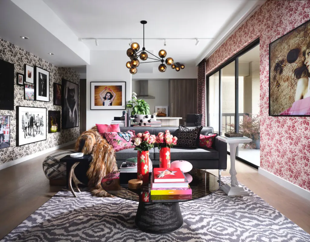 On the Warren Platner for Knoll table is Damien Hirst’s "Sp 598" pill sculpture, acquired at auction. Modo chandelier from Jason Miller Studio, Brooklyn. Sofa from Design Within Reach. Plaster goat-leg table by George Sellers. Back wall: Tyler Shields’ "Lindsay Lohan Shooter" photograph, from Guy Hepner, NYC. At left, photographs by Mark Seliger, Robert Stivers, Juergen Teller, David LaChapelle, and Marilyn Minter. (Photo by Lisa Petrole)