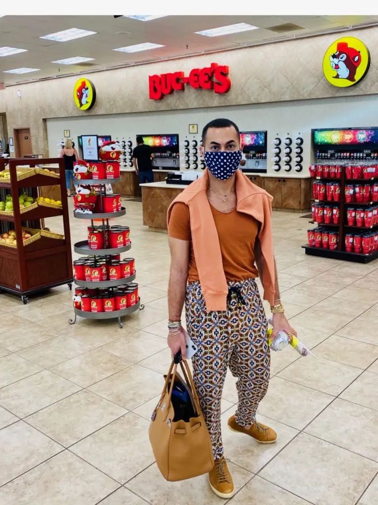 Fady Armanious dons a mask by his partner Bill Baldwin's sister, Mickie Baldwin Ross, for a road trip. (Courtesy photo)