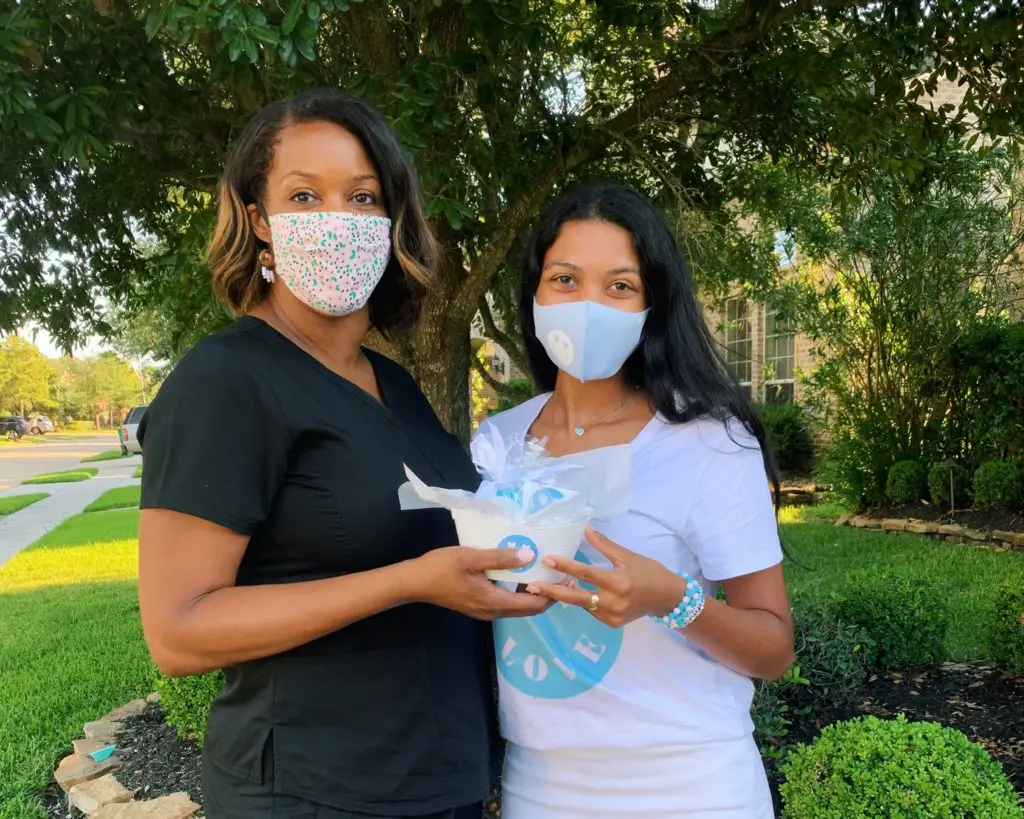 Gia McCrae with physical therapist Jessica Evans