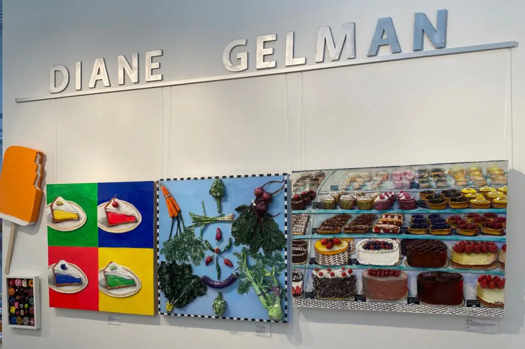 A wall of colorful Pop-inflected creations at Diane Gelman's studio sited in The Silos at Sawyer Yards complex. (Photo courtesy the artist) 