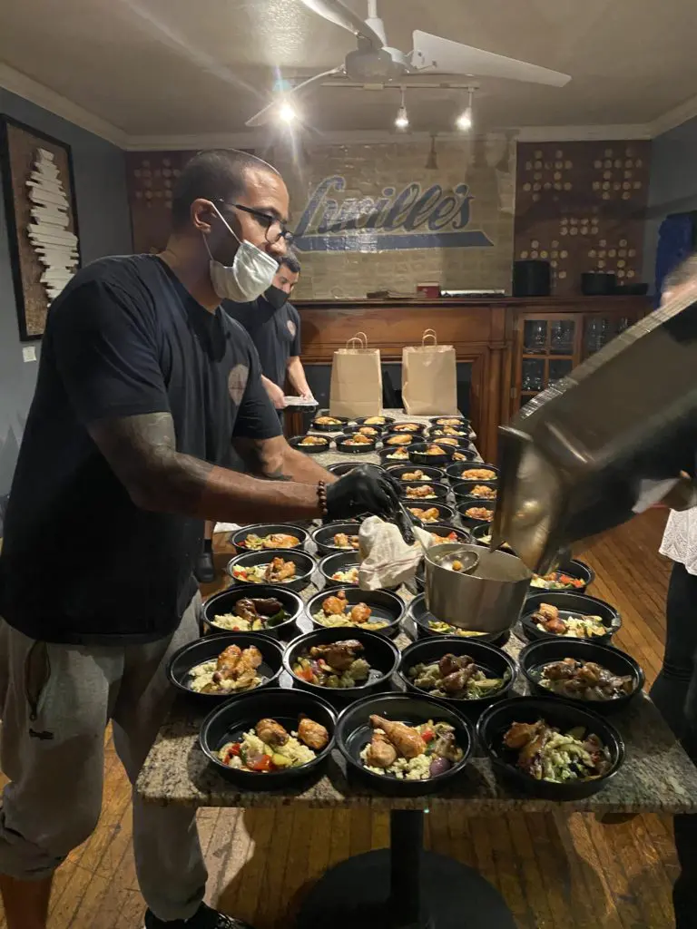 Lucille's team at work preparing meals for the World Central Kitchen initiative.