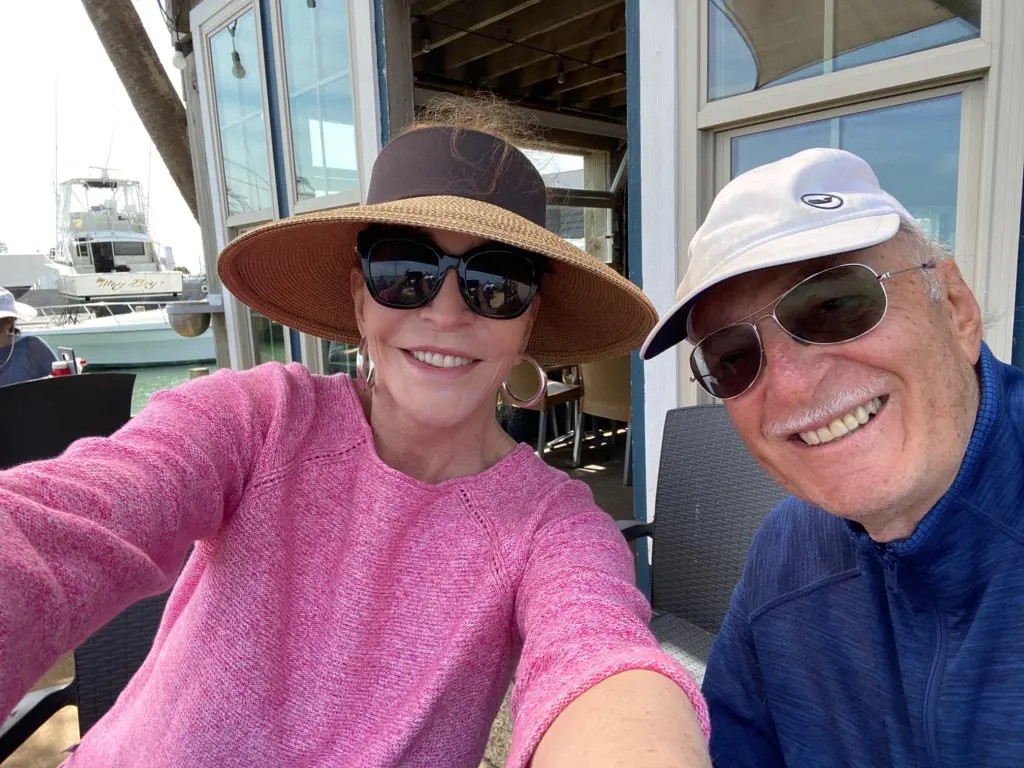Shelby Hodge & Shafik Rifaat in Rockport, Texas, she in Eric Javits open crown sun hat, he in his Viking Vines cap.