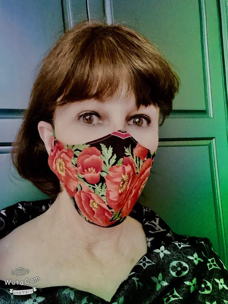 Shelby Hodge in a mask by Debra Linse (Courtesy photo)