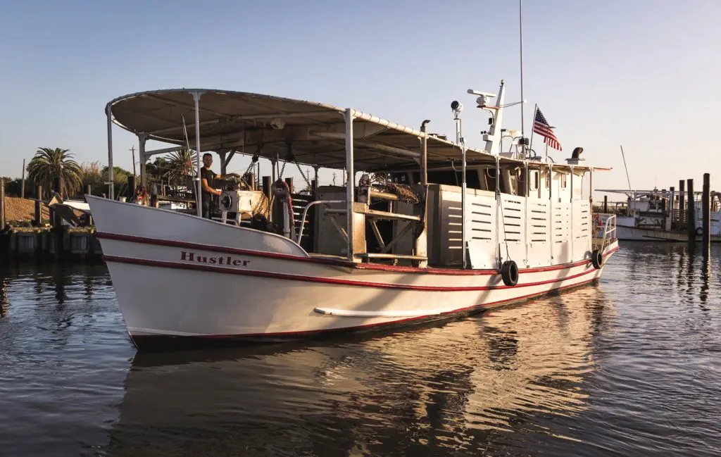 The oyster boats of Prestige Oysters are integral to the new Pier 6 Seafood & Oyster House, which is packing in fans in the Gulf Coast berg of San Leon, Texas. (Photo courtesy of Prestige Oysters)