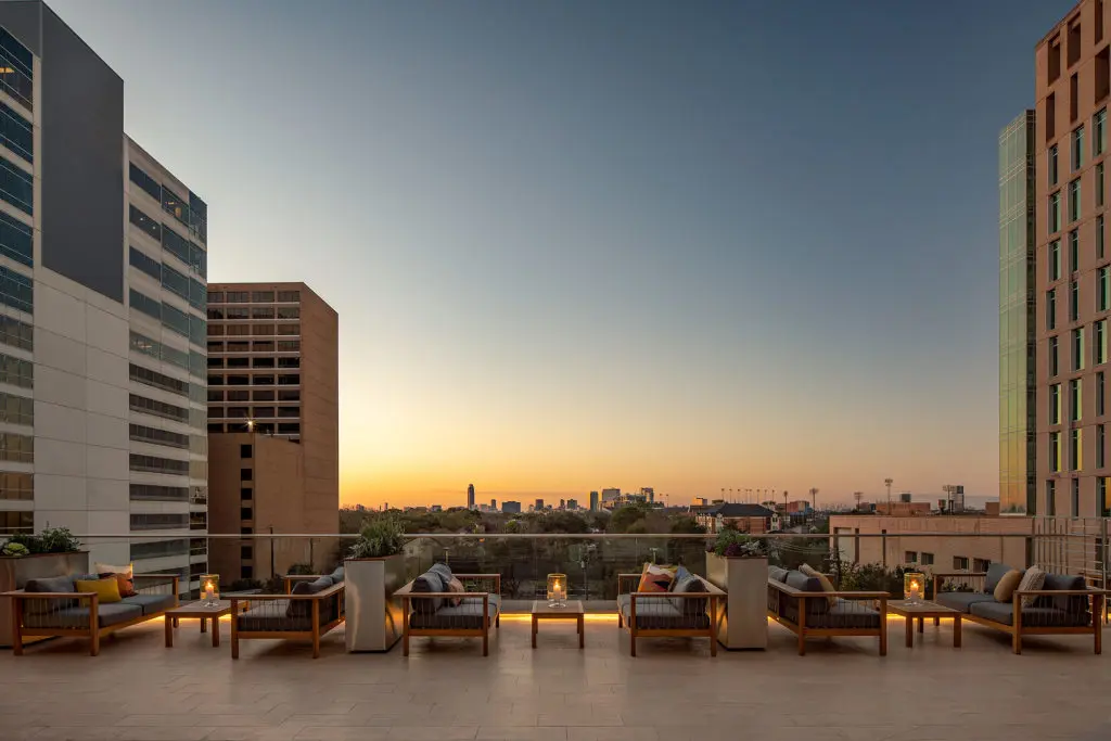 Beautiful sunset view on terrace of The Westin Houston Medical Center, overlooking the treetops of Rice University and the core of the Medical Center (Photo by The Westin Houston Medical Center)