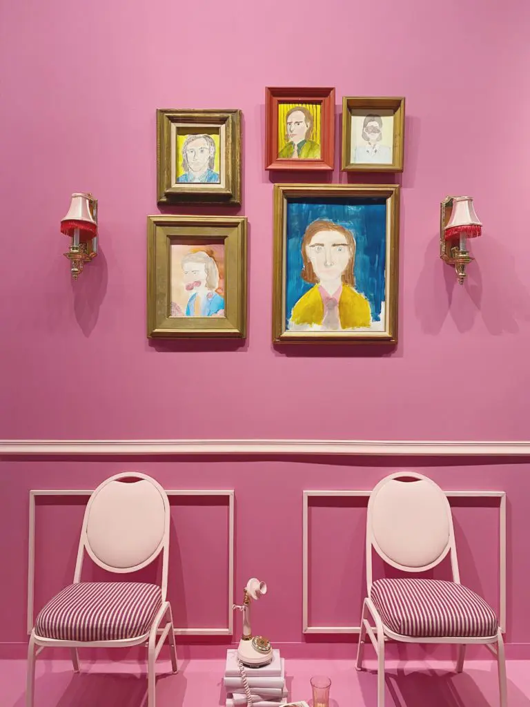 James Glassman's bubblegum-pink panel depicts American film director, producer, and screenwriter Wes Anderson.
