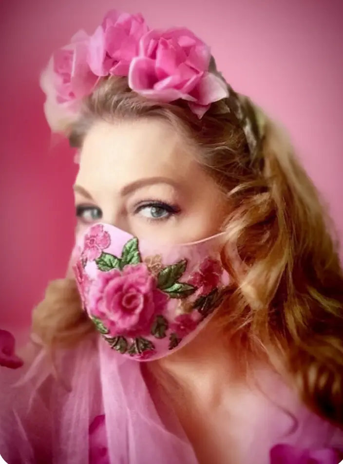 The glamorous Debra Linse in one of her embellished floral masks and floral headband. (Courtesy photo)
