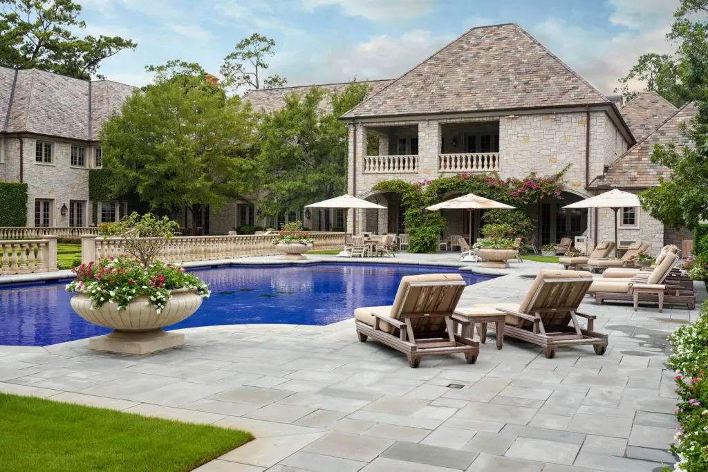 The swimming pool at 120 Carnarvon is tiled in sapphire blue.  (Photo by Nathan Schroder/Douglas Elliman)
