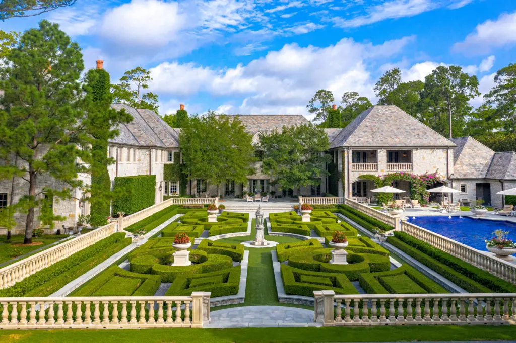 The parterre garden is adjacent to the swimming pool. (Photo by Nathan Schroder/Douglas Elliman)