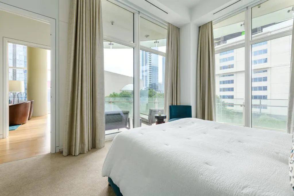 Second bedroom with view to terrace.