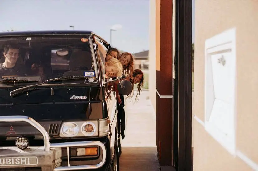 Jordan Barrus shows off the convenience of their drive thru window at the next Coco Shrimp to open.