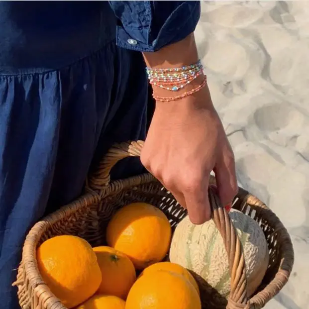 Gigi Clozeau's resin bracelets and necklaces sparkle like the sea. You can find them at Ylang 23.