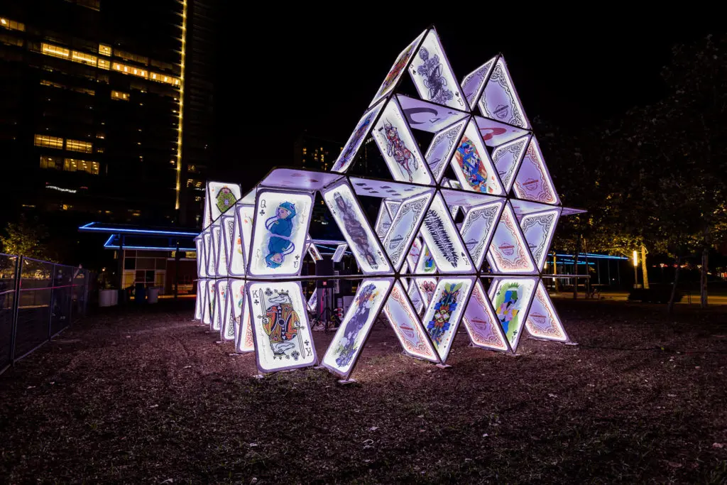 The House of Cards installation will light up Discovery Green nightly through October 11. (Photo by  Trish Badger, Courtesy of Weingarten Art Group)
