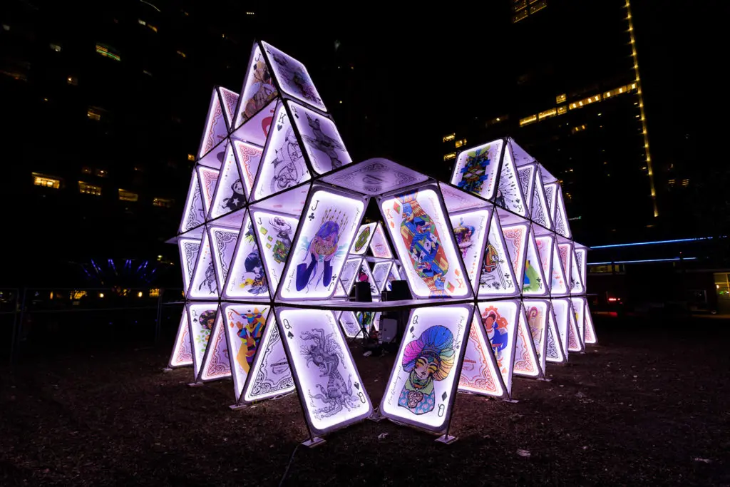 The House of Cards installation will light up Discovery Green nightly through October 11. (Photo by  Trish Badger, Courtesy of Weingarten Art Group)