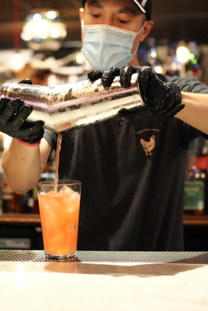 The Goode Bird menu includes adult beverages to-go. (Photo by Allison Moorman)