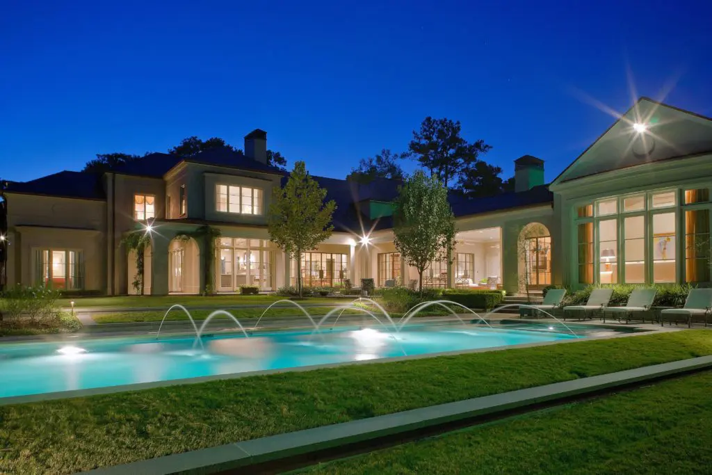 Spectacular night view with chasing fountains in the pool. 