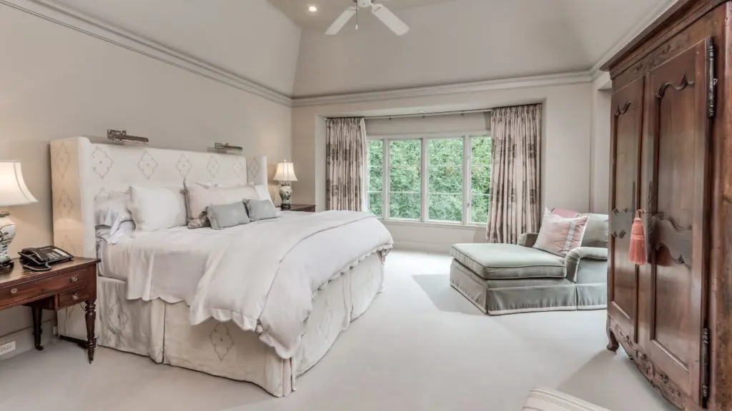 The serene palette of the main bedroom.