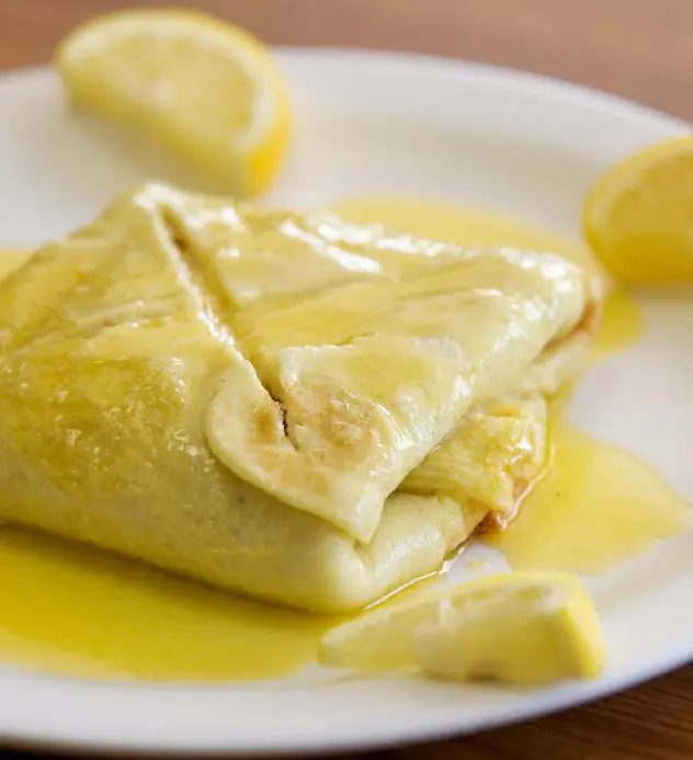 Then it is folded and hash marks are cut in the top to serve the German pancake. 