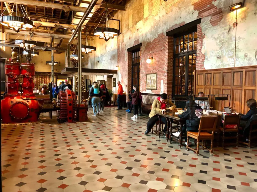 Exposed brick and time-work tile flooring. Photo by Courtney Dabney.