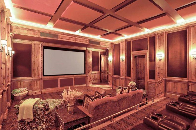  The in-home theater is beautifully paneled thereby maintaining the British ambience of the house. (HAR photo) 
