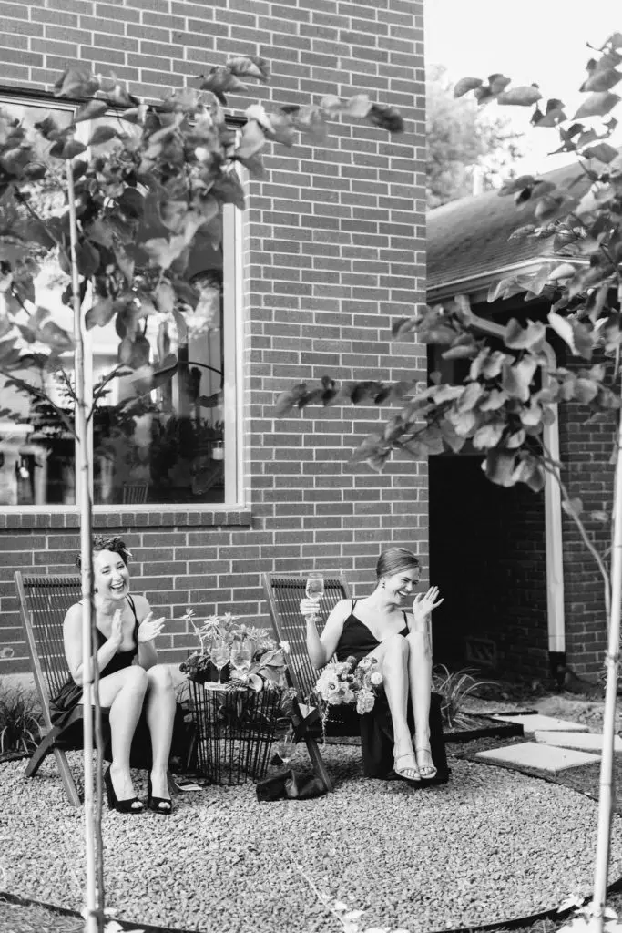 Bridal party quafs cocktails in the front garden. (Photo by Mustard Seed Photography)
