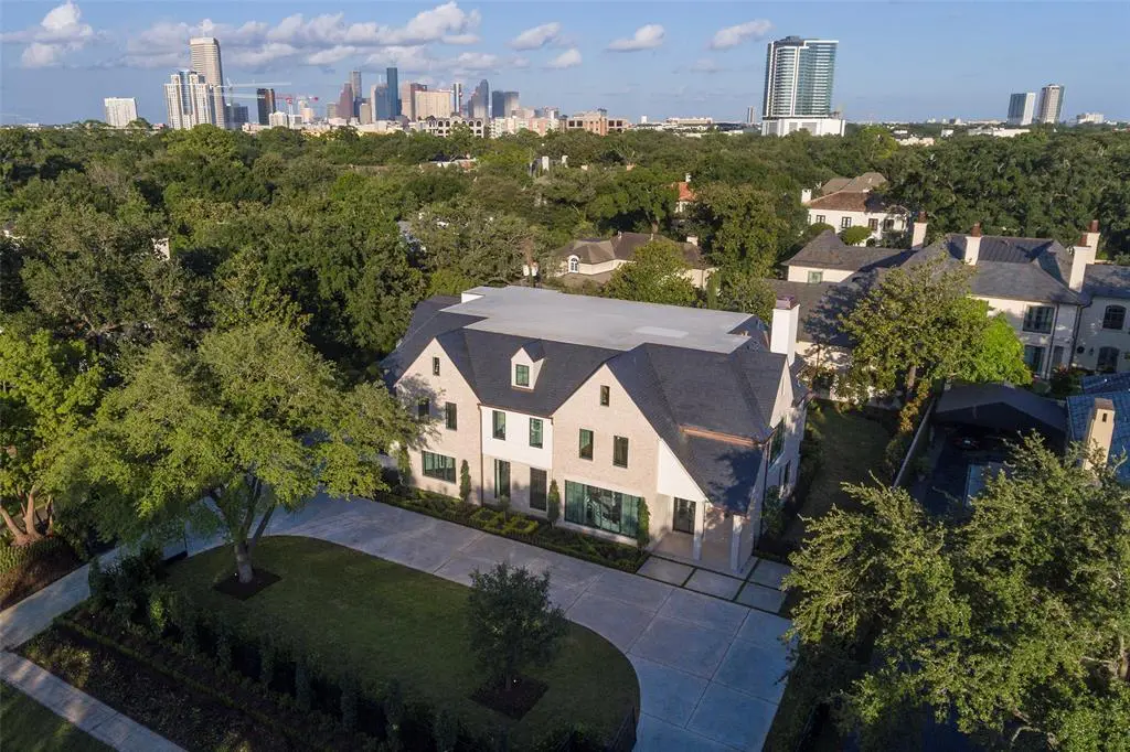 The Al Ross luxury home at 1059 Kirby Drive salutes English Tudor design with a modern twist. (HAR photo)