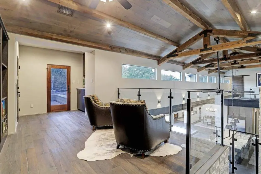 The second-floor library leads to the rooftop terrace.