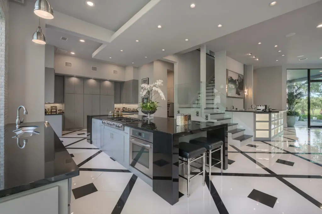 A wide-open kitchen bespeaks of classy cooking and home entertaining.