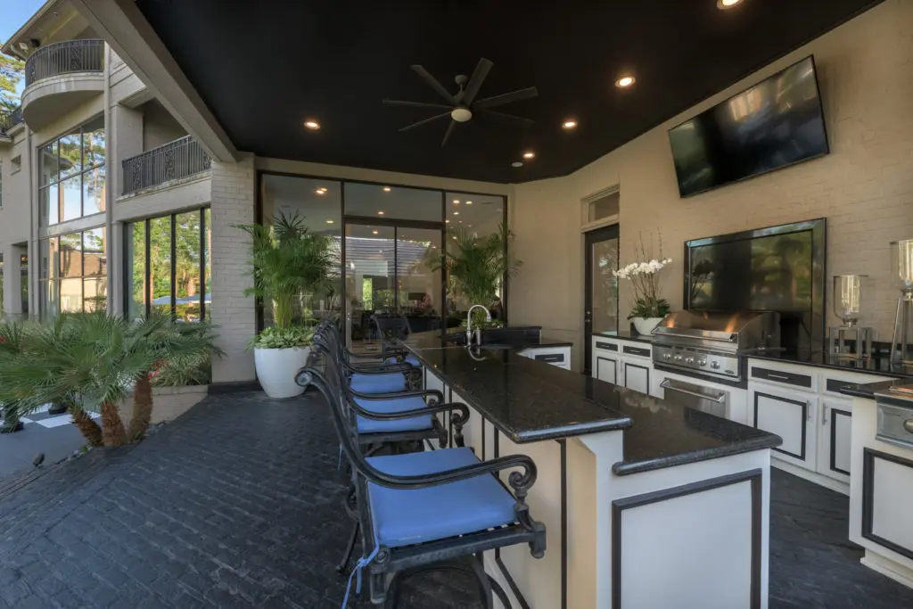 The elaborate summer kitchen invites outdoor entertaining.