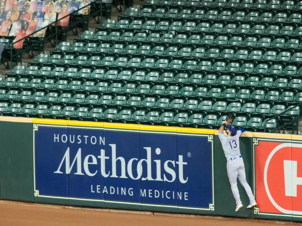 Kyle Tucker's home run just eluded Rangers right fielder Joey Gallo. (Photo by F. Carter Smith)