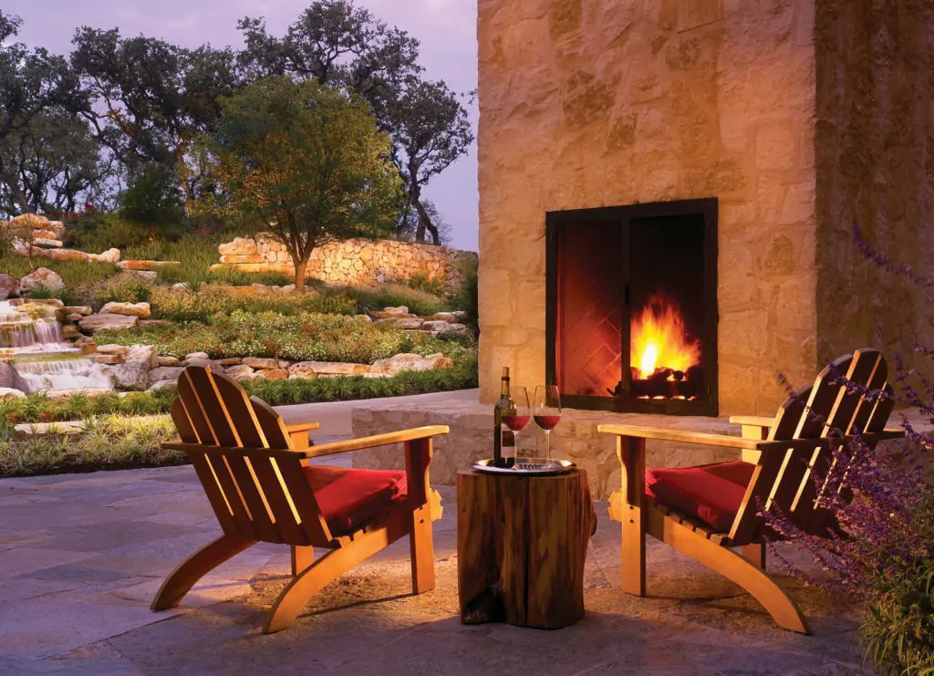 The back porch offers tons of space to socially distance and enjoy a fire pit and cocktails.