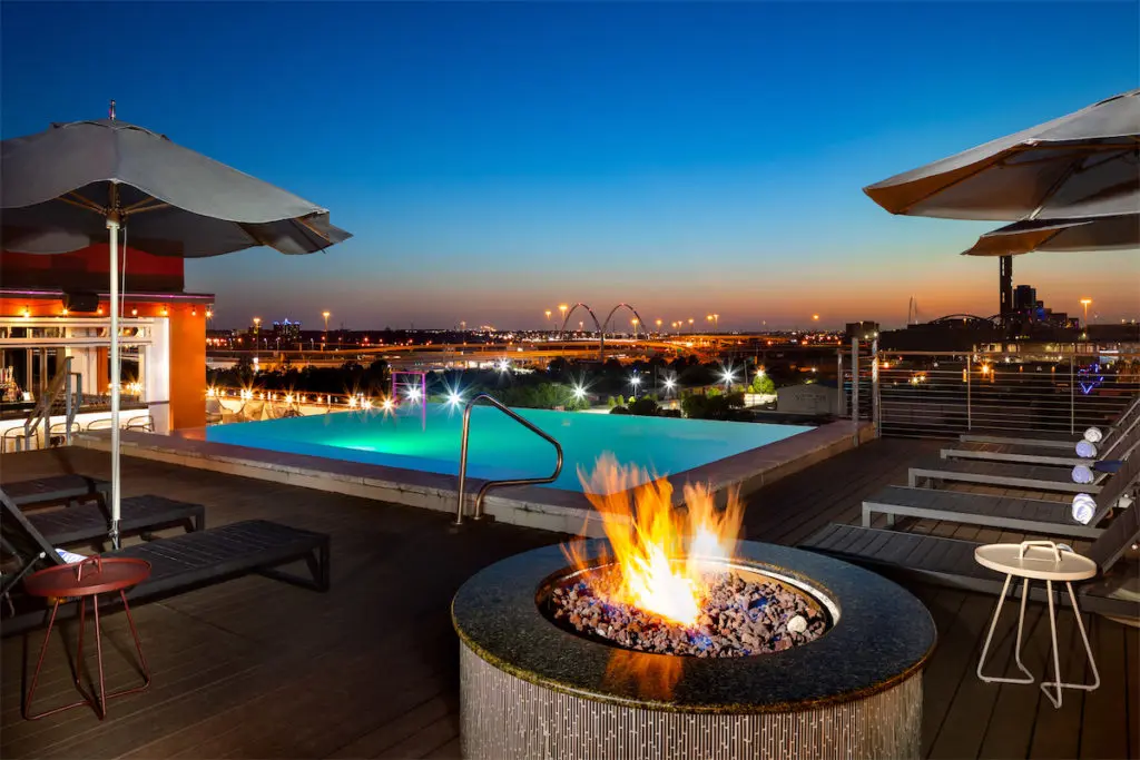 Fire pits are available at night at the pool. (Courtesy of CANVAS)