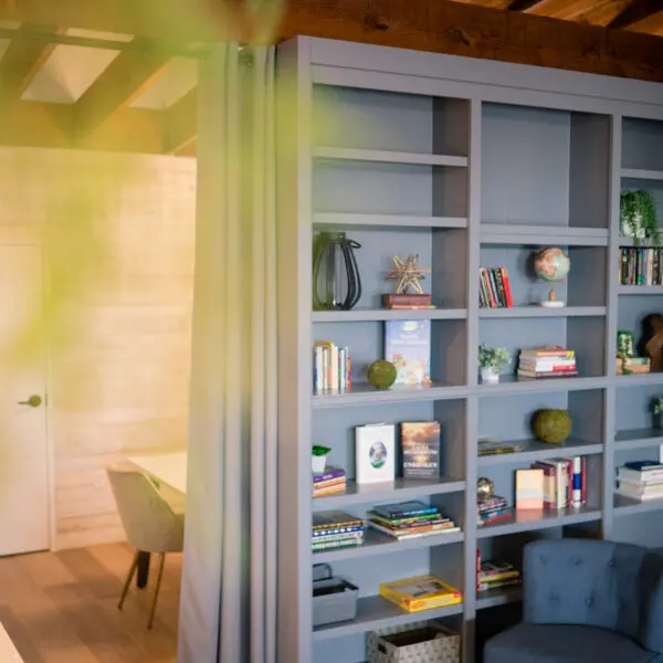 Homey touches include bookshelves and reading niches. Photo by Lacy Lane.