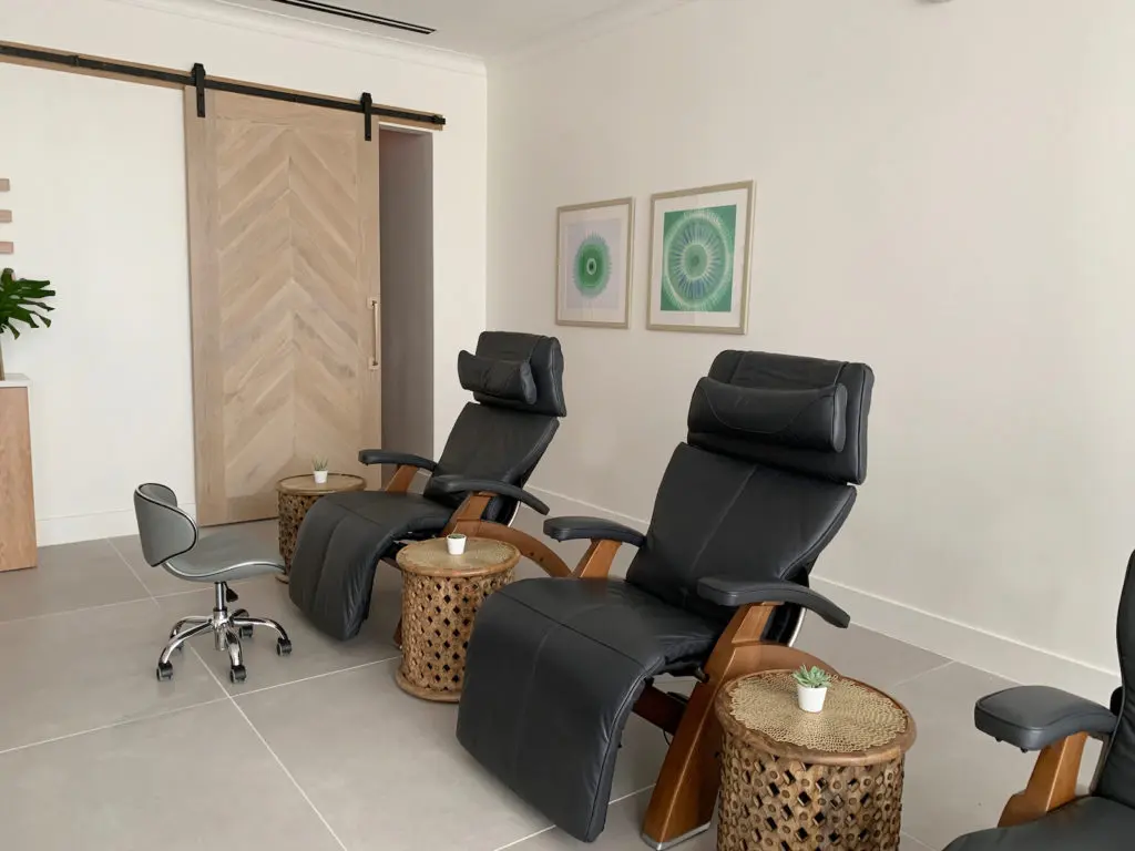 An expanded nail therapy salon with double the zero-gravity chairs (eight instead of four) and — for the first time — natural light