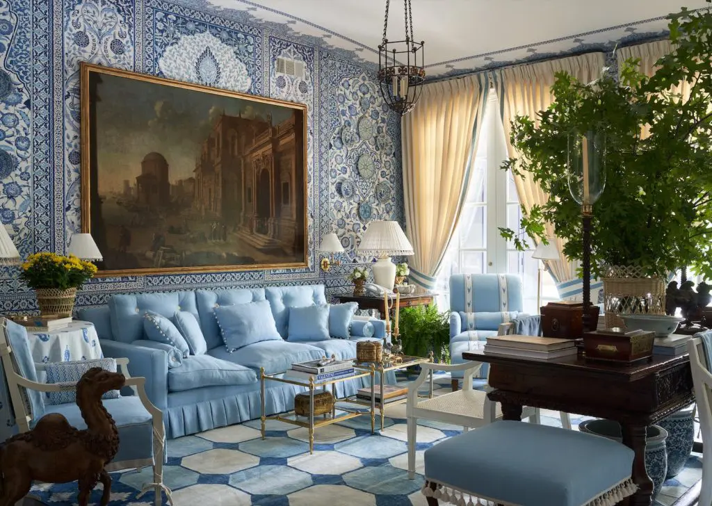 Dallas Kips Bay Decorator House: A large-scale painting from John Nelson Antiques in L.A., is a dramatic foil for the custom Iksel wallpaper. Sofa is Mark Sikes for Chaddock Home, covered in Schumacher fabric. (Photo Stephen Karlisch)