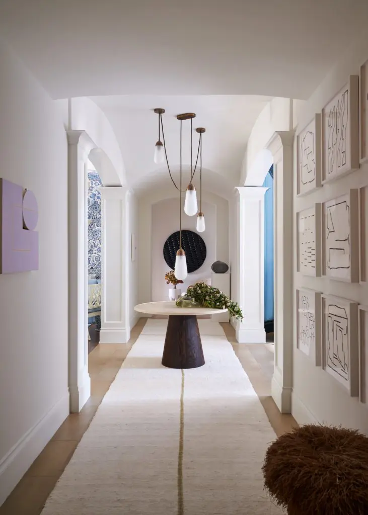 Gallery and powder room designed by M. Naeve. (Photo by Stephen Karlisch)