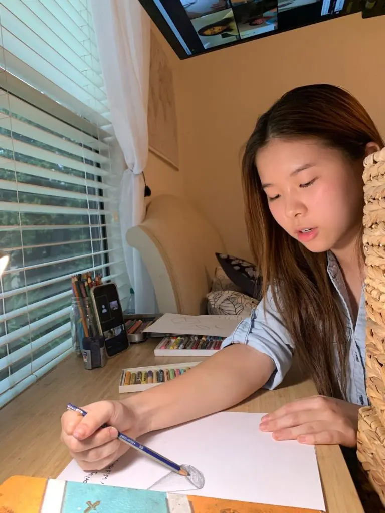 Teaching to Give's Lina Wu teaches a virtual art lesson.