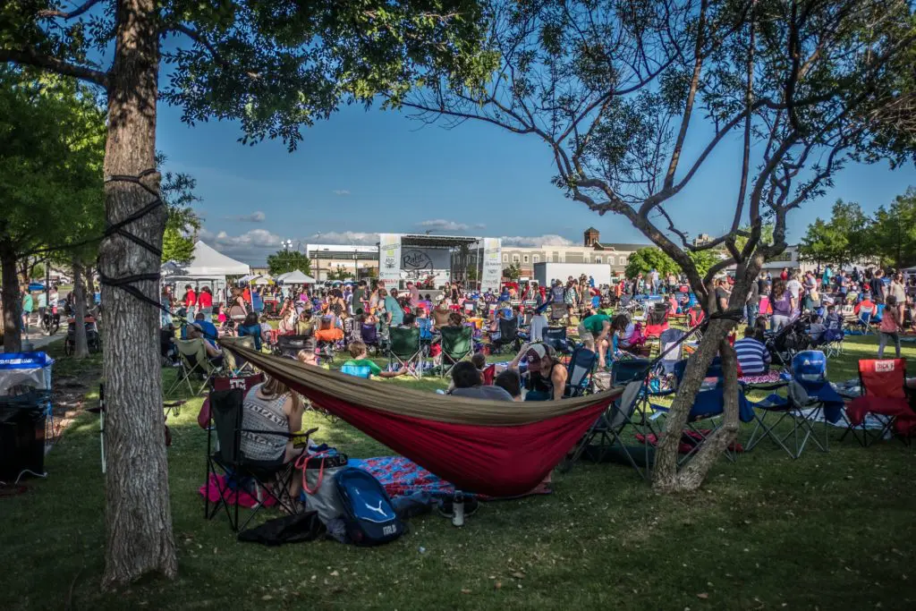 In normal years, the neighborhood relaxes at Friday on the Green. Photo by Olaf Growald.