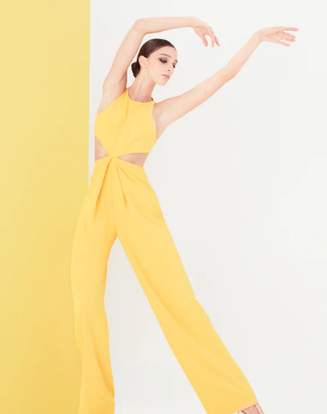 Alice + Olivia sunshine yellow jumpsuit with cutouts at the waist. (Photo courtesy of Alice + Olivia)