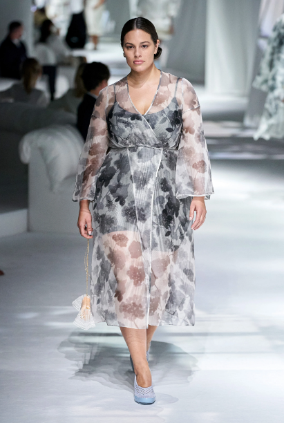 Ashley Graham walks the runway at the Fendi runway show in a sheer wrap dress. (Photo courtesy of Fendi)