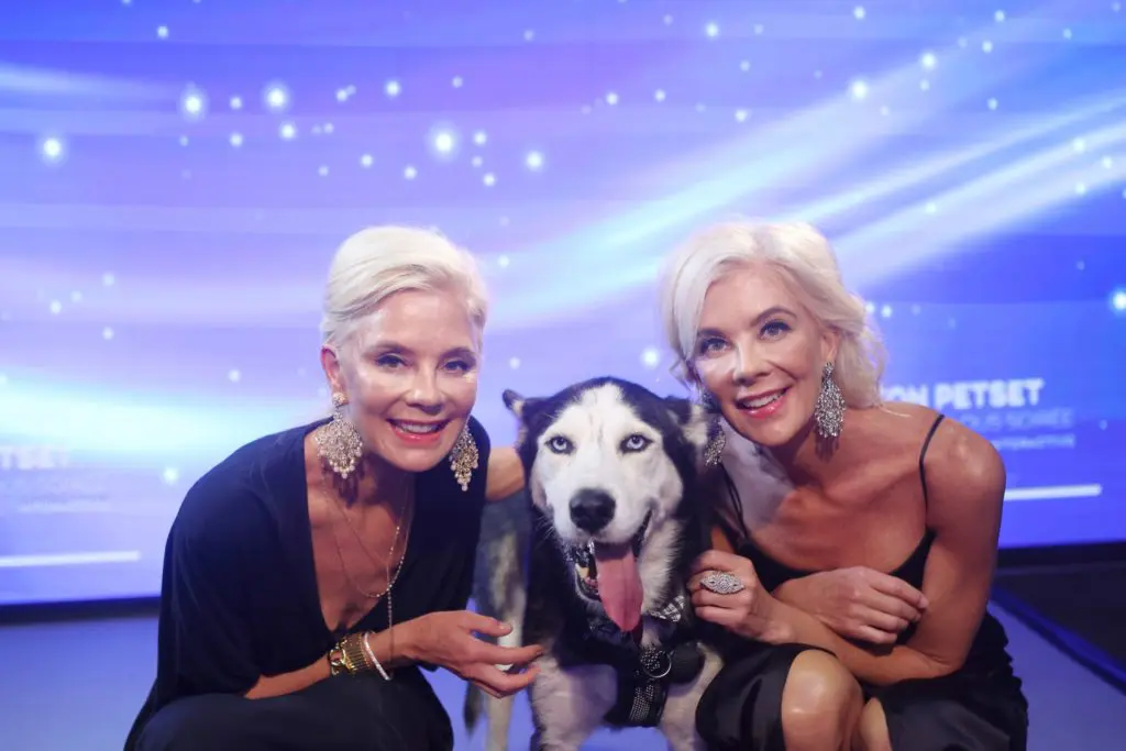 Houston PetSet co-presidents Tena Lundquist Faust and Tama Lundquist with rescue dog Max.(Photo by Quy Tran PhotographyHouston)