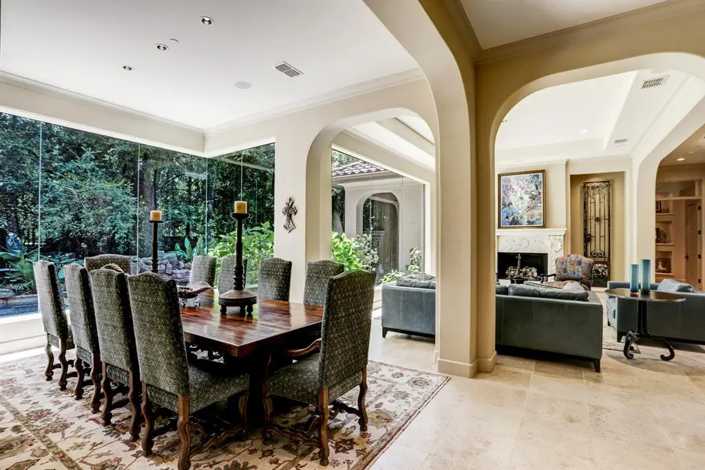 Wickwild living and dining open with frameless windows