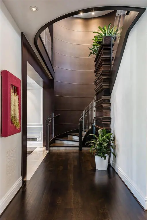 The estate is filled with handsome dark wood. (Photo by Alex Perry, Allie Beth Allman & Assoc.)
