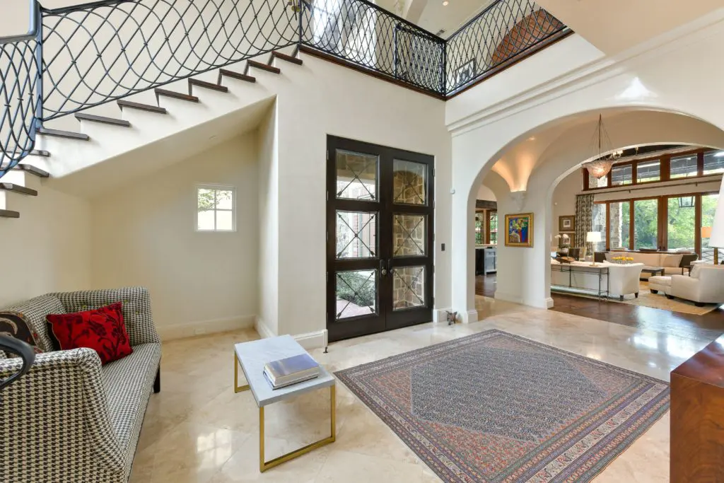 This Preston Hollow dream house has a dramatic entry.