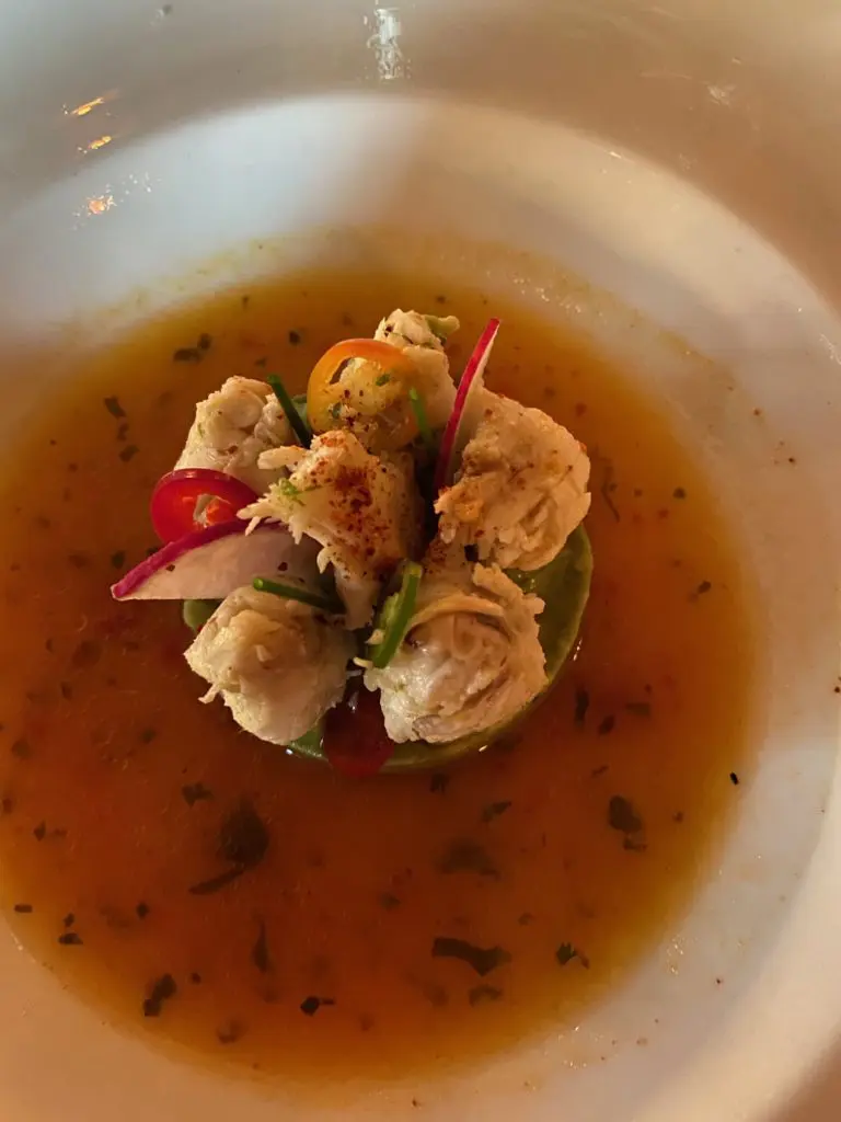 Le Colonial executive chef Hassan Obaye launches the five-course wine dinner with lump Yuzu crabmeat. 
